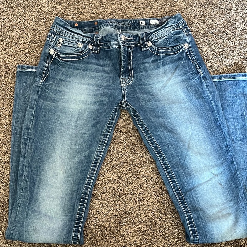 Miss me medium wash jeans 30x35 small black stain